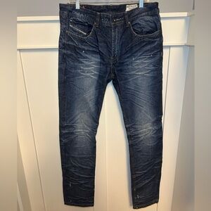 Diesel DNA "dirty new age" stacked slim distressed jeans